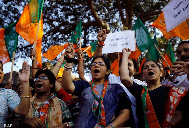Activists of India's main opposition Bharatiya Janata Party shout slogans during a protest to mourn the death of a gang rape victim in Mumbai, India, Saturday, Dec. 29, 2012.  (AP Photo/Rafiq Maqbool)