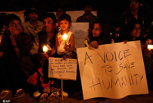 Indians light candles and mourn the death of a gang rape victim, in Hyderabad, India , Saturday, Dec. 29, 2012.  (AP Photo/ Mahesh Kumar A.)