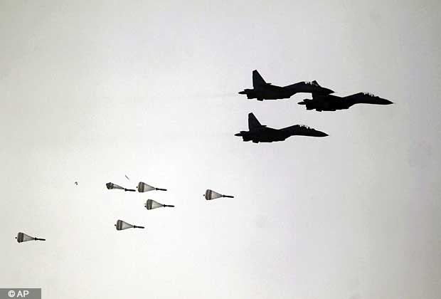 An Indian Air Force Sukhoi MKI aircraft releases bombs towards a target during the 