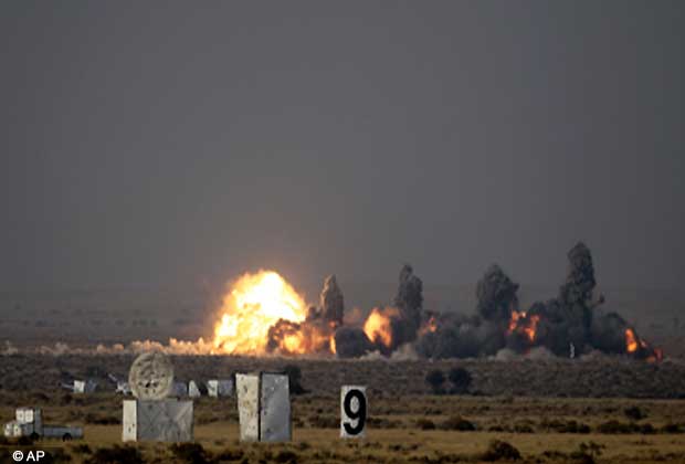 Bombs fired by an Indian Air Force Jaguar aircraft hits its target during the 