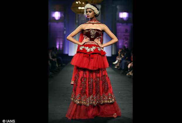 Model walk the ramp for designer Narendra Kumar Ahmed show on day 2 of India Bridal Week. (Photo IANS)