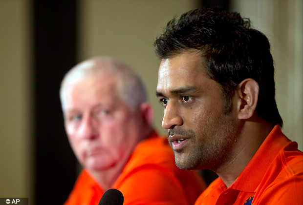 Indian coach Duncan Fletcher, left, watches captain Mahendra Singh Dhoni speak during a press conference ahead of the ICC T20 cricket World Cup in Colombo, Sri Lanka, Wednesday, Sept. 12, 2012. (AP Photo)