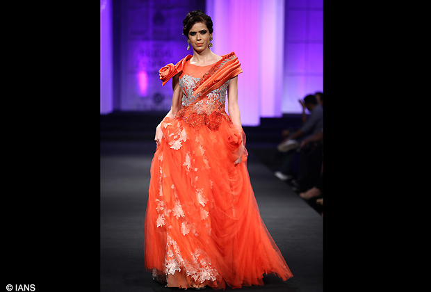 Model walks the ramp displaying an outfit by designers Anjalee and Arjun Kapoor at Aamby Valley India Bridal Fashion Week 2012 in Mumbai. (Photo IANS)