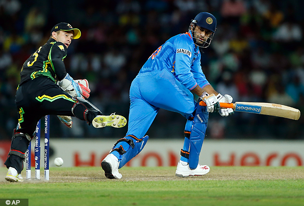 India's batsman Irfan Pathan, right, looks back after playing a shot as Australia's wicketkeeper Matthew Wade tries to stop the ball during their ICC Twenty20 Cricket World Cup Super Eight match in Colombo, Sri Lanka, Friday, Sept. 28, 2012. (AP Photo/Eranga Jayawardena)