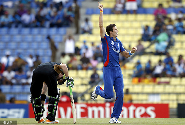 England's bowler Steven Finn, right, celebrates the dismissal of New Zealand's batsman Martin Guptill, left, during the ICC Twenty20 Cricket World Cup Super Eight match in Pallekele, Sri Lanka, Saturday, Sept. 29, 2012. (AP Photo)