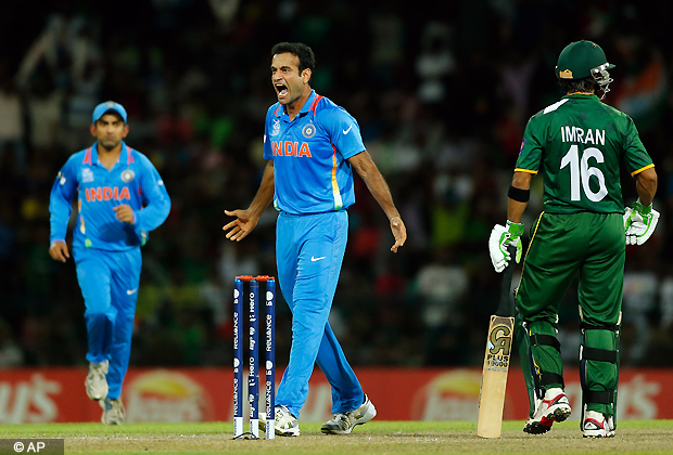 India's bowler Irfan Pathan, center, reacts taking the wicket of Pakistan's batsman Imran Nazir, right, during their ICC Twenty20 Cricket World Cup Super Eight match in Colombo, Sri Lanka, Sunday, Sept. 30, 2012 . (AP Photo/Eranga Jayawardena)