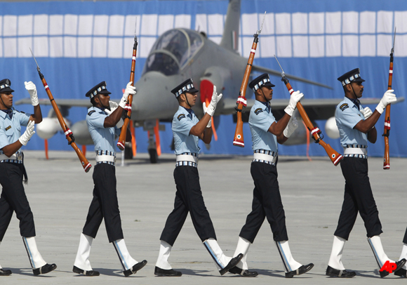 Indian Air Force's Air Warrior drill team display rifle handling skills during Air Force Day celebrations in Hindon, on the outskirts of New Delhi, India, Monday, Oct. 8, 2012. The IAF celebrated its 80th anniversary Monday. (AP Photo)