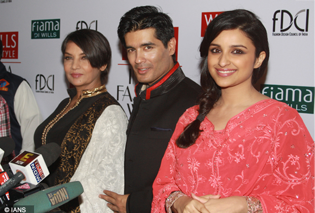 Models walk on the ramp for designer Manish Malhotra and Bollywood actress Shabana Azmi and Parineeti Chopra Wills Lifestyle India Fashion Week 2013 in New Delhi. (Photo IANS)