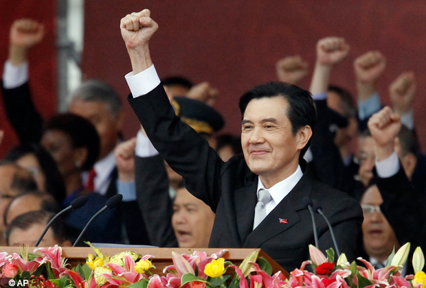 Taiwan's President Ma Ying jeou cheers with the audience during National Day celebrations marking the 101st anniversary of the founding of the Republic of China, in front of the Presidential Office in Taipei, Taiwan, Wednesday, Oct. 10, 2012. Ma pledged greater efforts to fix the island's economy, now limping along at about a 2 percent annual growth rate. (AP Photo/Wally Santana)