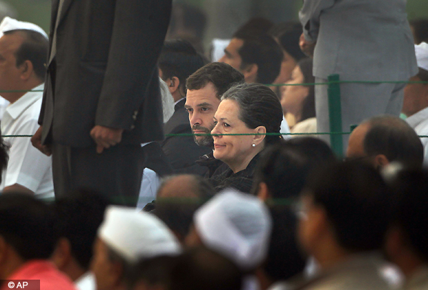 Congress party President Sonia Gandhi and Rahul Gandhi attend the memorial service on the death anniversary of former Indian Prime Minister Indira Gandhi in New Delhi on Oct. 31, 2012. Gandhi was gunned down by her Sikh bodyguards in 1984. (AP Photo)