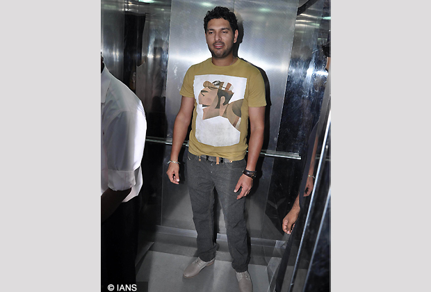 Indian cricket player Yuvraj Singh pose during the launch of Sophie Chaudhary new music album Hungama Ho Gaya in Mumbai. (Photo IANS)