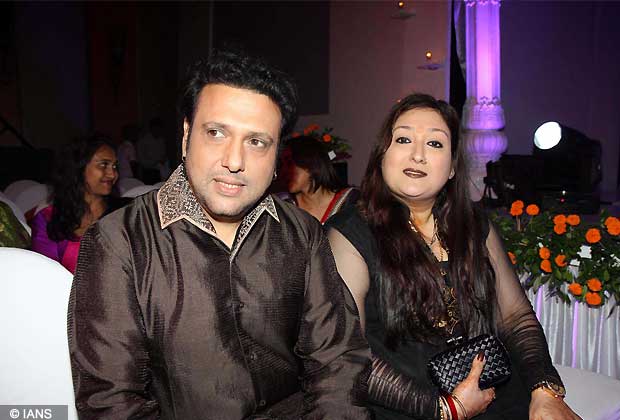 Bollywood actress Govinda with wife Sunita at designer Rohhit Verma's Fashion Show at Hotel JW Marriott in Juhu, Mumbai. (Photo IANS)