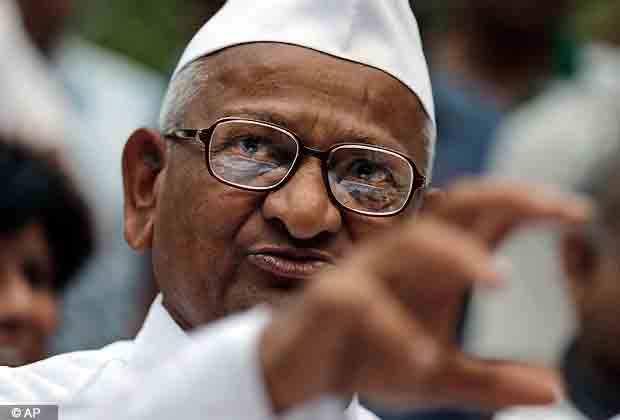 Anti corruption activist Anna Hazare addresses the media in New Delhi, Nov. 10, 2012. Hazare held the conference to introduce his new team that will help take forward the apolitical anti corruption battle, according to a news agency. (AP Photo)