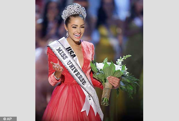 Miss USA, Olivia Culpo, waves to the crowd after being crowned Miss Universe during the Miss Universe competition, Wednesday, Dec. 19, 2012, in Las Vegas. (AP Photo/Julie Jacobson)