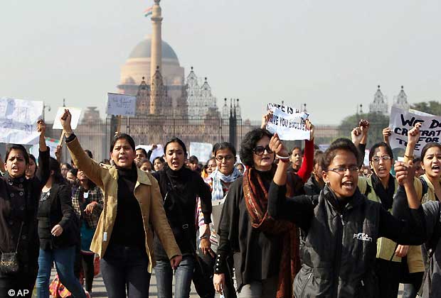 Activist of the All India Democratic Women's Association and Young Women's Christian Association (YWCA) students shout slogans as they take part in a protest march from the Presidential Palace to India Gate in New Delhi, India, Friday, Dec. 21, 2012. The gang rape and beating of a 23 year old student by six men on a bus in New Delhi may have sparked days of protests and demands for authorities to take tougher action, but for women in India it is just an extreme example of what they have to live with. (AP Photo)