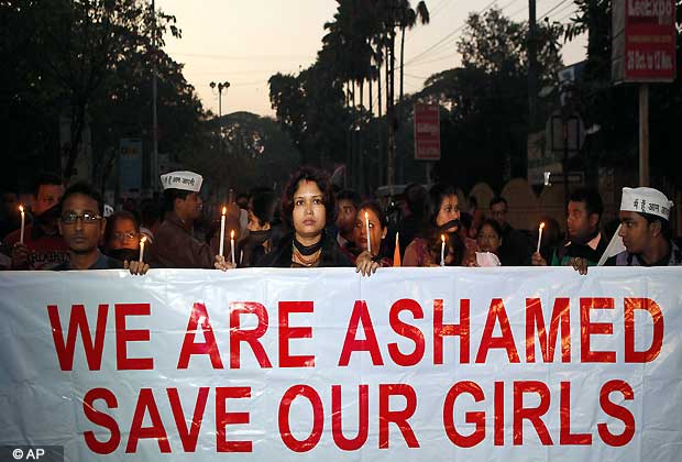 Indian women participate in a silent procession to mourn the death of a gang rape victim, in Gauhati, India, Saturday, Dec. 29, 2012. (AP Photo/Anupam Nath)