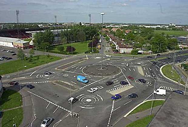 Most Confusing Roundabout in the World, Magic Roundabout, Swindon, UK, England was constructed in 1972 and consists of five mini roundabouts arranged in a circle.