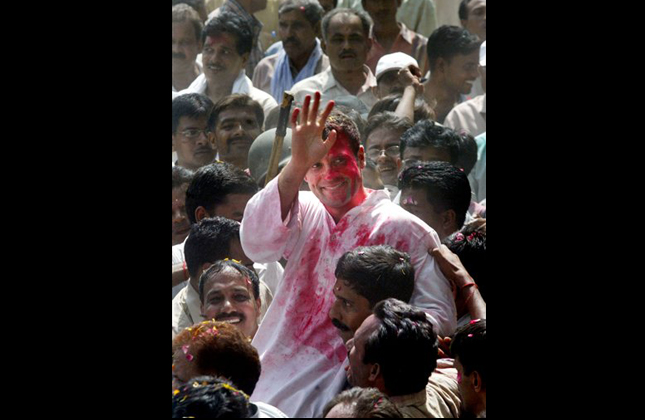FILE In this Thursday, May 11, 2006 file photo, Congress party supporters lift party leader Rahul Gandhi after his mother and party President Sonia Gandhi won the elections in Rae Bareli, India. Rahul Gandhi was appointed Vice President of the party at a special two day long party seminar on Saturday, Jan. 19, 2013. (AP Photo/Rajesh Kumar Singh, File)