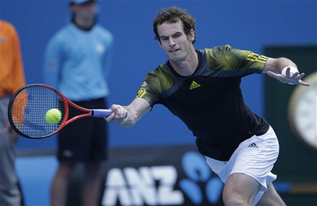 Britain's Andy Murray hits a forehand return to France's Gilles Simon during their fourth round match at the Australian Open tennis championship in Melbourne, Australia, Monday, Jan. 21, 2013. (AP Photo/Rob Griffith)