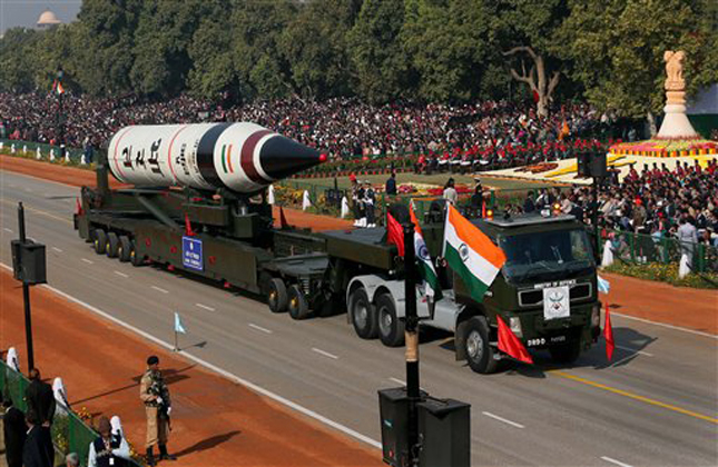 The long range ballistic Agni V missile is displayed during Republic Day parade, in New Delhi, India, Saturday, Jan. 26, 2013. Indian across the country celebrated Republic day, which commemorates the 1950 adoption of its constitution. The celebrations include military marches and display of weaponry, cultural pageants and dances. (AP Photo /Manish Swarup)