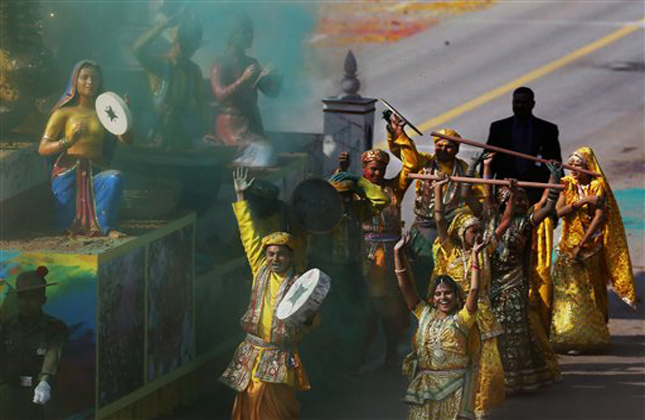 A tableaux representing the northern Indian state of Uttar Pradesh move past during the annual Republic Day parade on Rajpath in New Delhi, India, Saturday, Jan. 26, 2013. Indians across the country celebrated Republic Day, which commemorates the 1950 adoption of its constitution. (AP Photo/Kevin Frayer)