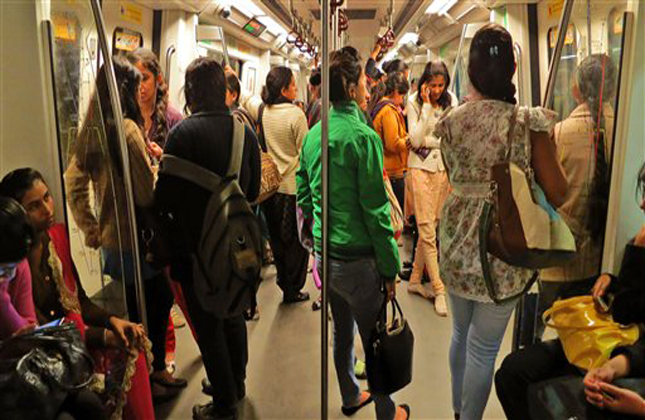 Indian women travel inside a Women Only metro train compartment in New Delhi, India, Saturday, Feb. 2, 2013. Five men pleaded not guilty after being formally indicted Saturday in a special court on 13 charges, including rape and murder, in the fatal gang rape of a woman in a New Delhi bus, a lawyer said. The brutal attack set off nationwide protests, sparking a debate about the treatment of women in India and highlighting the inability of law enforcement agencies to protect them. (AP Photo/Yirmiyan Arthur)