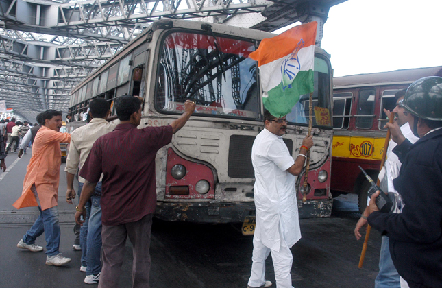 Congress activists blocked the Howrah Bridge to protest against violence in the state in Kolkata on Feb. 13. (Photo Kuntal Chakrabarty/IANS)