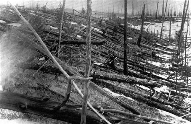 FILE In this 1953 file photo, trees lie strewn across the Siberian countryside 45 years after a meteorite struck the Earth near Tunguska, Russia. The 1908 explosion is generally estimated to have been about 10 megatons it leveled some 80 million trees for miles near the impact site. The meteor that streaked across the Russian sky Friday, Feb. 15, 2013, is estimated to be about 10 tons. It exploded with the power of an atomic bomb over the Ural Mountains, about 5,000 kilometers (3,000 miles) west of Tunguska. (AP Photo, File)