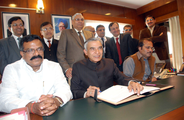 Minister of Railways Pawan Kumar Bansal with Ministers of State for Railways, Adhir Ranjan Chowdhury and Kotla Jaya Surya Prakash Reddy giving finishing touches to the documents of Railway Budget 2013 14 on the eve of its presentation before the Parliament in New Delhi on Feb. 25, 2013. (Photo IANS)