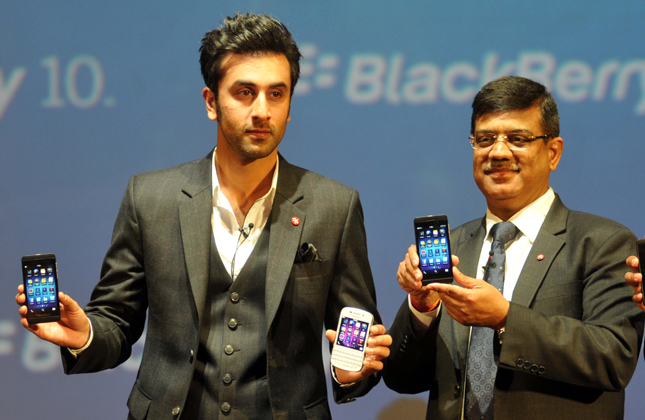 Bollywood actor Ranbir Kapoor, Brand ambassador, BlackBerry and Sunil Dutt, MD, BlackBerry India launches the BlackBerry Z10 smartphone in Mumbai on Feb. 25, 2013. (Photo Sandeep Mahankal/IANS)