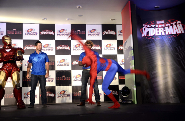 Marvel Super Heroes, Ironmanand Spiderman make a special apperance for Mumbai Indians teammates Ricky Ponting, Lasith Malinga and Kieron Pollard at the unveil of a special merchandise in Mumbai on April 7 2013. (Photo IANS)