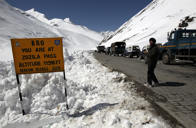 Zojila Pass on National Highway 1D, known as Ladakh s lifeline as it connects the region to the rest of country, reopened for vehicular traffic on April 6. The pass, which shuts down for about six with the onset of winter, opened 20 days earlier this year, compared to 2012, when it had opened on April 25. The clearing of the snow bound stretch across the 11,600 foot high Zojila along the 434 km long Srinagar Kargil Leh highway was undertaken by personnel of the Border Roads Organisation (BRO), which maintains the highway. An army convoy was the first to navigate the pass, followed by civilian traffic. (Photo IANS)
