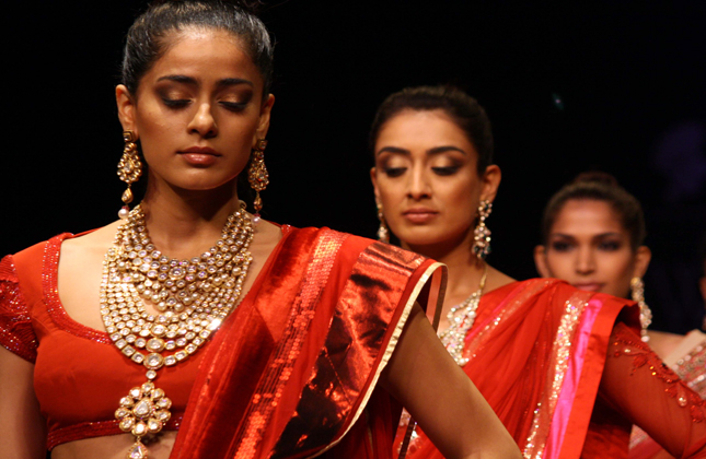 Models showcasing the PC Jewellers show at the IIJW in New Delhi,13 April 2013. (Photo Amlan Paliwal/IANS)