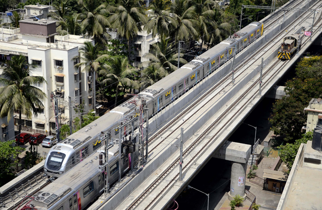 Maharashtra Chief Minister Prithviraj Chavan flagged off a trial run of Mumbai Metro at Versova Metro Station, Andheri in Mumbai on May 1, 2013. (Photo Sandeep Mahankal/IANS)