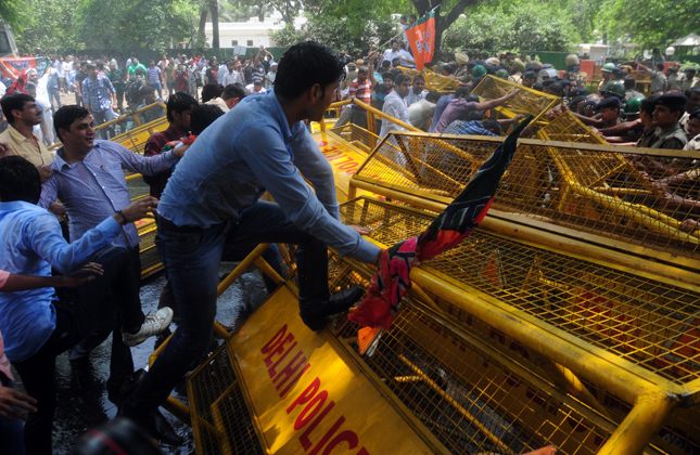 BJP activists protesting against UPA government in New Delhi on May 12, 2013. (Photo IANS)