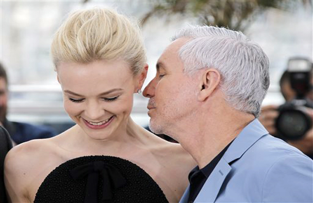 Actress Carey Mulligan and director Baz Luhrmann pose for photographers during a photo call for the film The Great Gatsby at the 66th international film festival, in Cannes, southern France, Wednesday, May 15, 2013. (AP Photo/Lionel Cironneau)