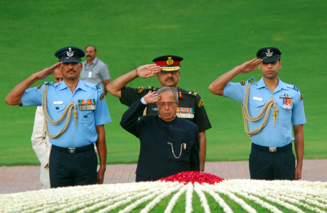 President Pranab Mukherjee paying homage to the country's first Prime Minister Jawaharlal Nehru on his 49th Death Anniversary at his memorial in Shantivan, New Delhi on May 27, 2013. (Photo IANS)