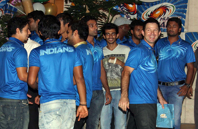 Mumbai Indians owner Nita Ambani with cricketers Sachin Tendulkar, Adity Tare, Rohit Sharma, Ricky Ponting, Lasith Malinga,Harbhjan Singh and other Mumbai Indians players poses during the party hosted for their victory in the IPL 2013 on Monday night. (Photo IANS)