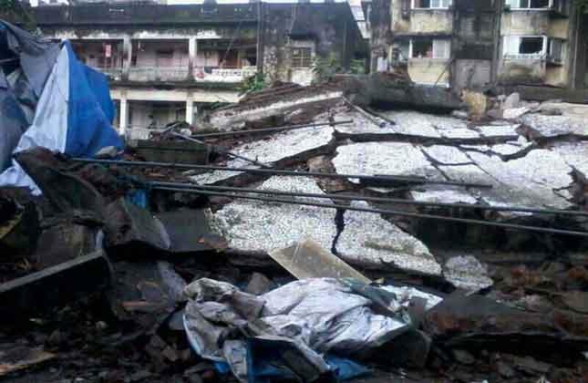 At least five people were killed and six others were injured when an abandoned four stored building, which was occupied by some unauthorized dwellers, Piyush building collapsed at Dahisar in Mumbai on Saturday 22nd June 2013. (Photo Sandeep Mahankal/IANS)