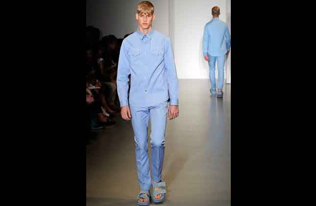 A model wears a creation for Calvin Klein men's Spring Summer 2014 collection, part of the Milan Fashion Week, unveiled in Milan, Italy, Sunday, June 23, 2013. (AP Photo/Giuseppe Aresu)