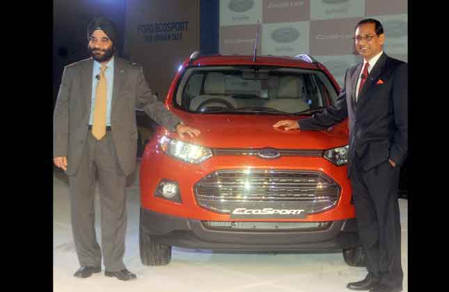 President and Managing Director of Ford India, Joginder Singh and Vinay Piparsania, Executive Director for Marketing Sales and service, poses with the new Ford EcoSport during its launch in New Delhi on June 26, 2013. Ford EcoSport has been launched at an entry level pricing of Rs. 559,000(Ex showroom, New Delhi). (Photo IANS)