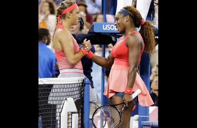 Serena Williams, greets Victoria Azarenka, of Belarus, at the net after winning the women's singles final of the 2013 U.S. Open tennis tournament in New York. (AP Photon)