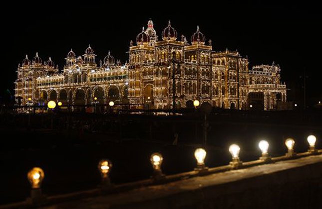 About 96,000 lamps illuminate Mysore Palace, a major tourist attraction, as part of the celebrations on the eve of last day of Dusshera festival in Mysore.