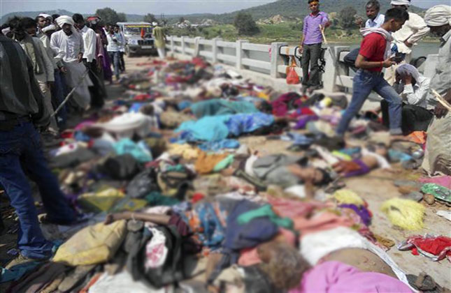 The death toll in the stampede during Navratri festivities near a temple in Madhya Pradesh's Datia district climbed to 115 with a number of people who had carried away the bodies of their relatives turning up for autopsy.(AP Photo)