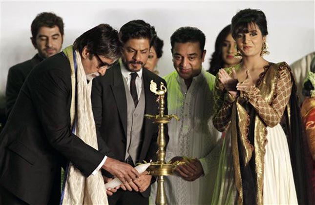 Bollywood megastar Amitabh Bachchan lights the lamp at Kolkata film festival in Kolkata. (AP Photo)