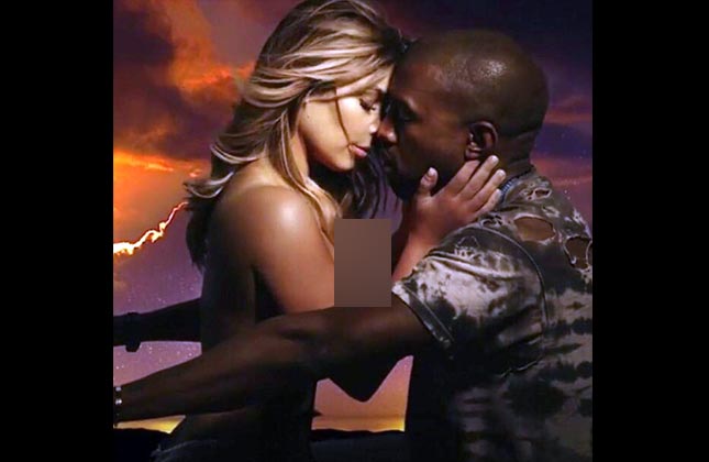 Well...Kim, once again goes topless but this time for her love. Socialite Kim Kardashian flaunts her naked body in her beau Kanye West's music video.