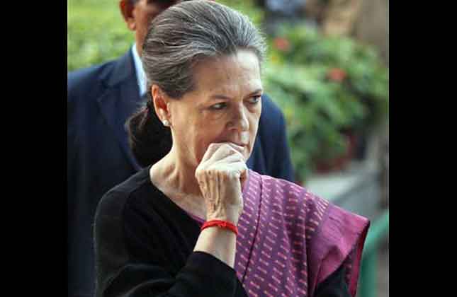 Ruling Congress party president Sonia Gandhi reacts after addressing the media in New Delhi. (AP Photo)