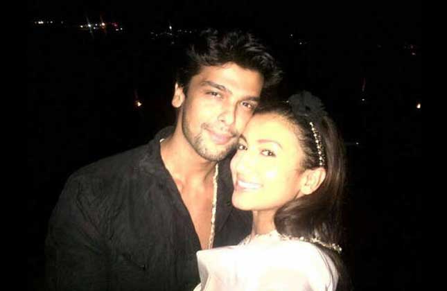 The famous love birds of Big Boss 7 Kushal and Gauhar are out on holidays. Probably this was their first time that reel life love turned into real life love.