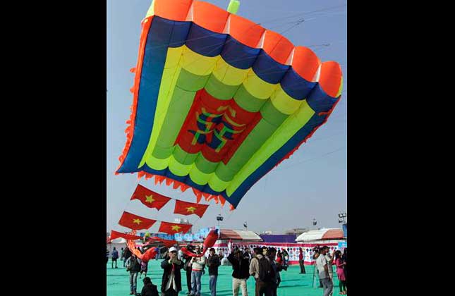 As the festival of Makar Sakranti is approaching Indian are gearing for their participation in kite festivals. It attracts them most in this festival. There are kite flying competitions held at state and local levels where eminent kite flyers take part. (AP Photo)