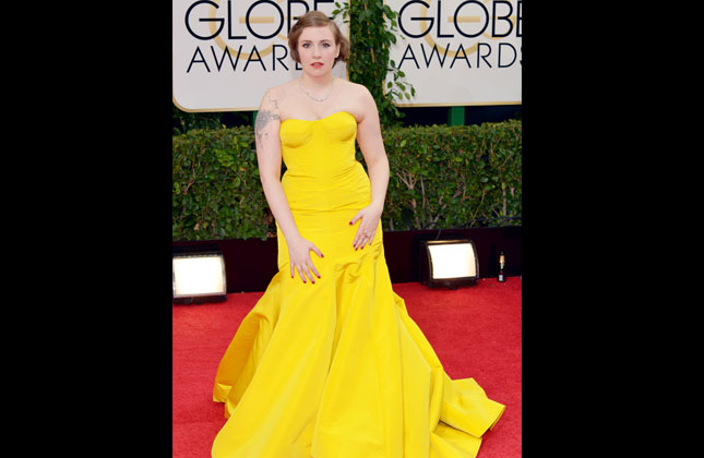 Dress should be chosen as per you body shape, weigh and size and if you miss to think upon any of these aspects while choosing a dress then it becomes a blunder a big wardrobe malfunction and will bring your style statement a black star. Here are a few such examples from the international awards function The Golden Globe Awards 2014. Lena Dunham in Zac Posen There's usually fun dress on the red carpet courtesy the Girls star but this canary yellow number was not one of them.